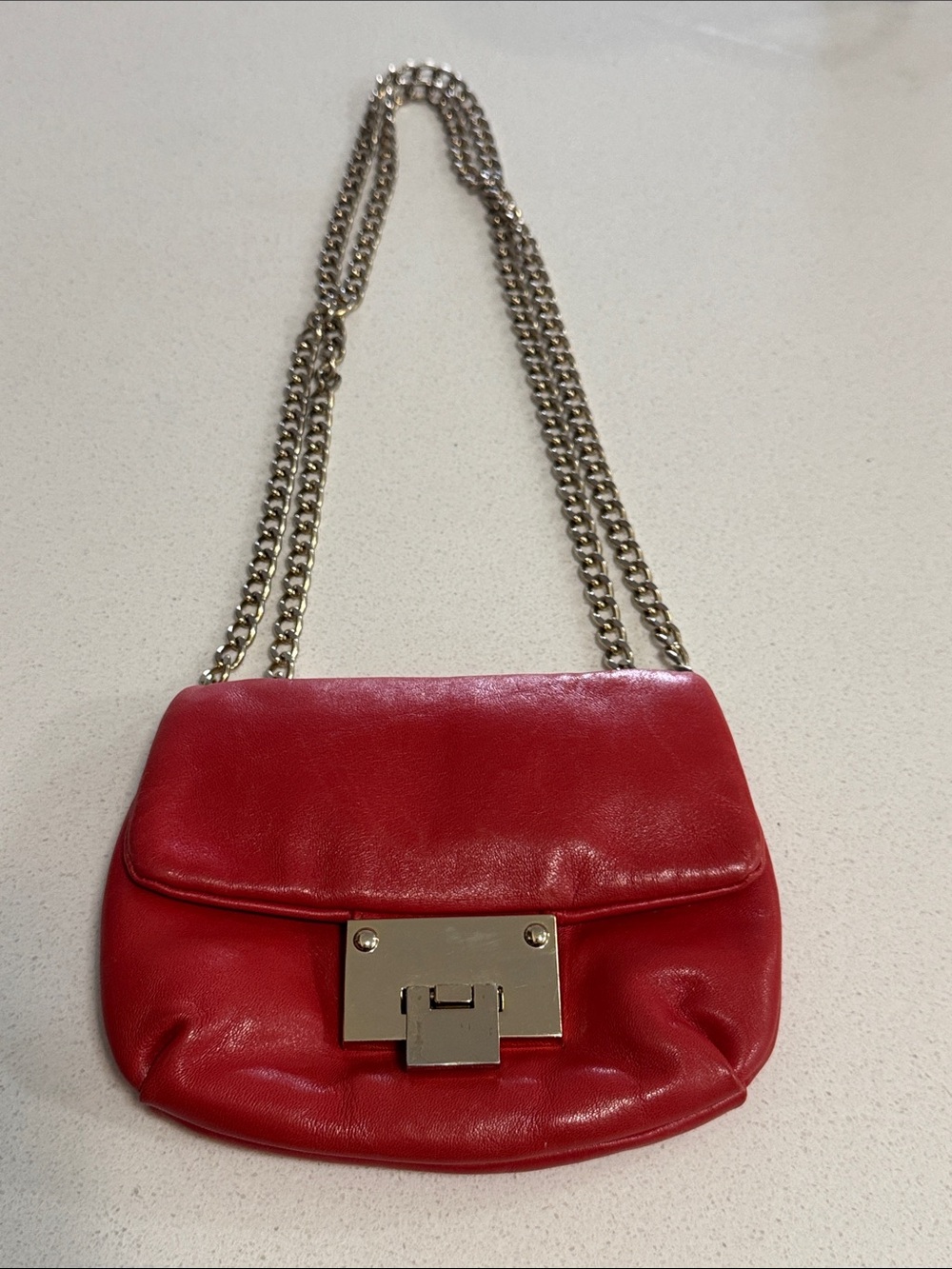 Brown’s couture red leather small crossbody purse